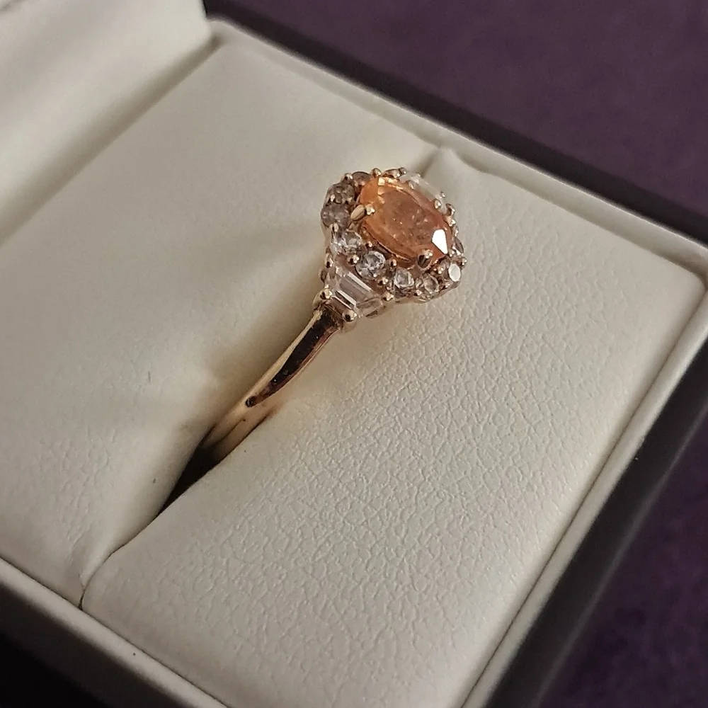 Spessartine Garnet & Natural White Zircon Halo Ring.